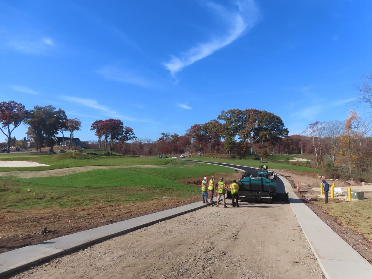 Golf Course Paving project in New Haven, CT — paving crew laying cart path