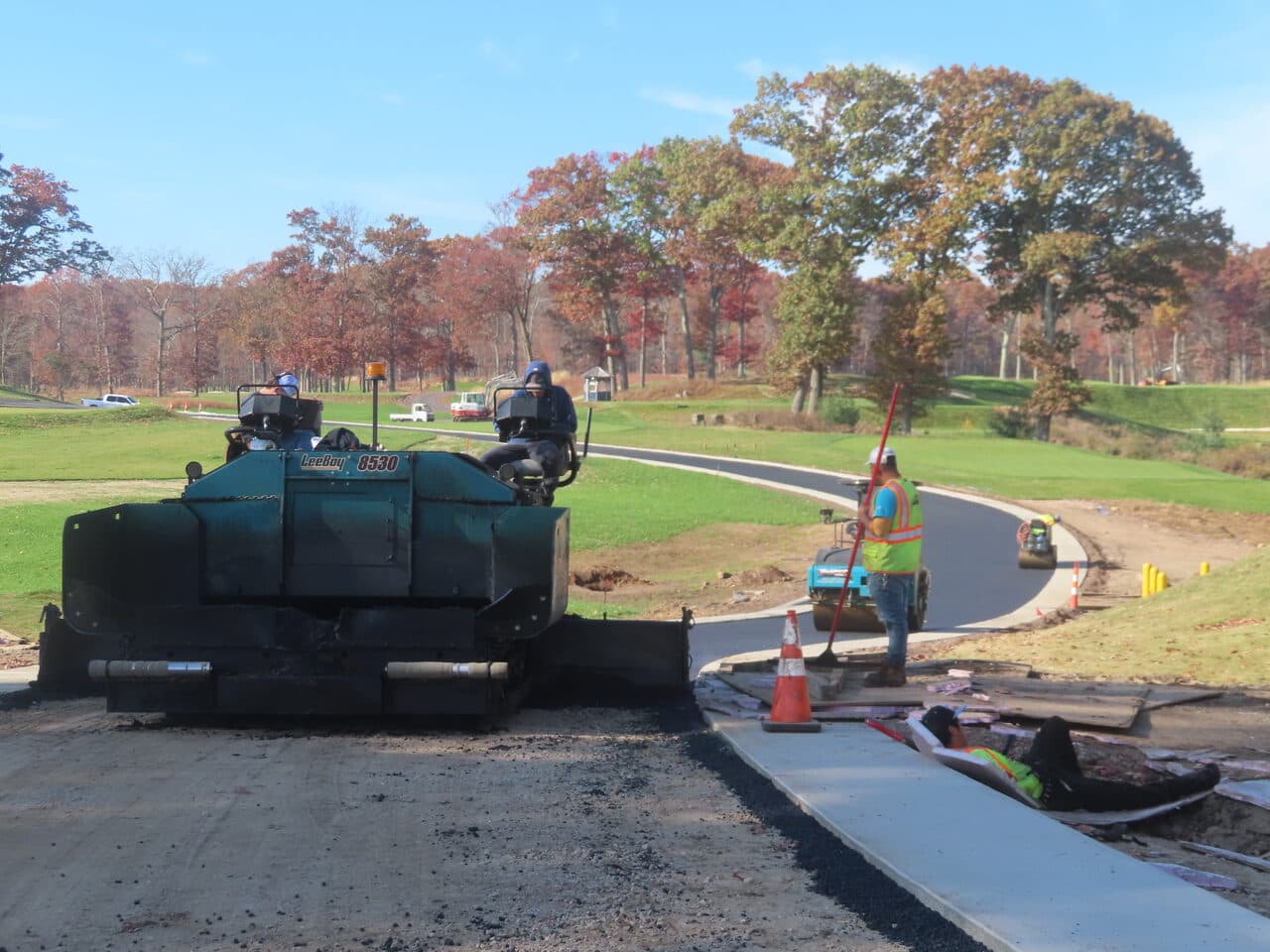 Golf Course Paving project in New Haven, CT — LeeBoy 8530 paver laying path