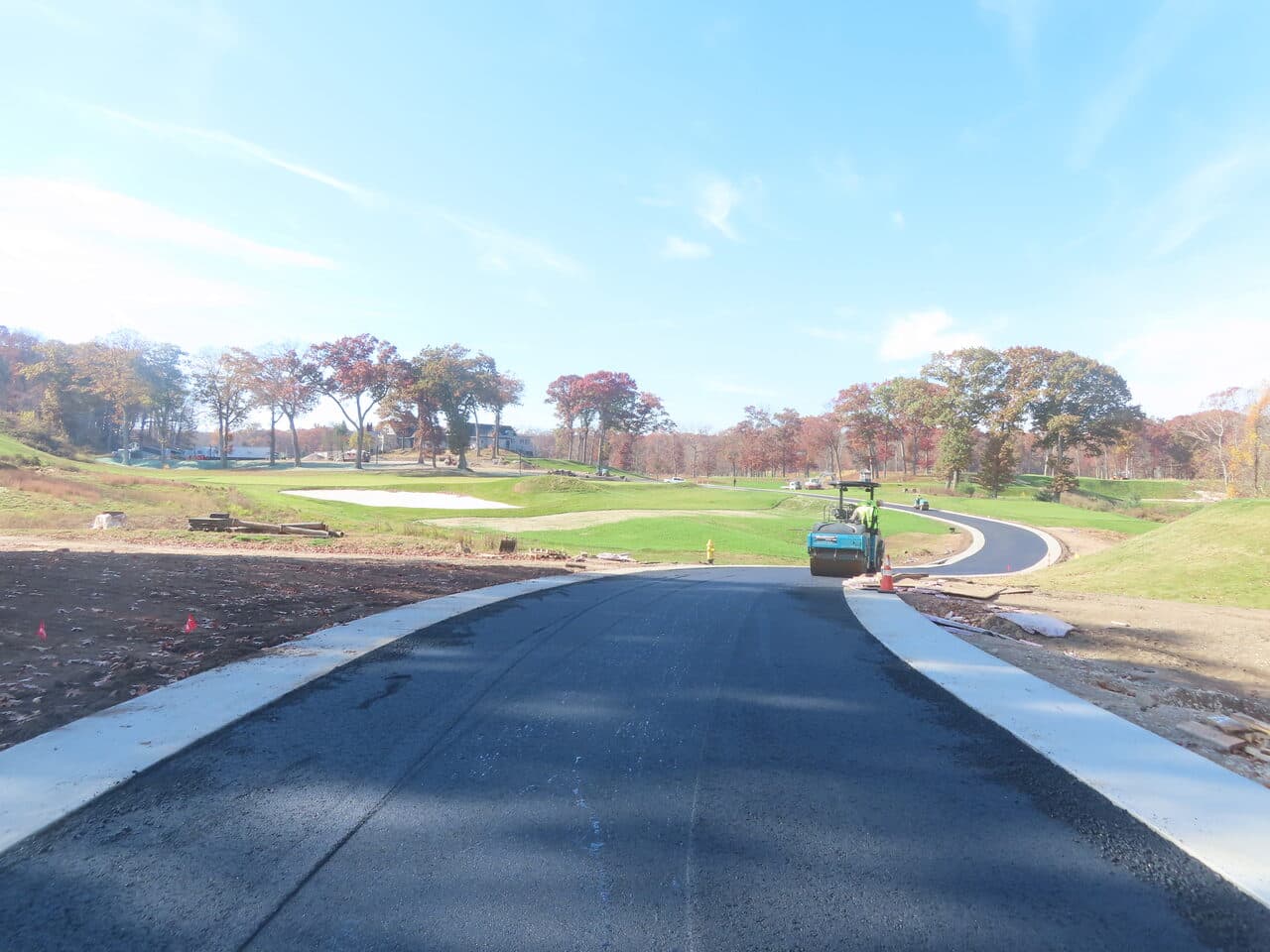 Golf Course Paving project in New Haven, CT — new asphalt cart path curving through course