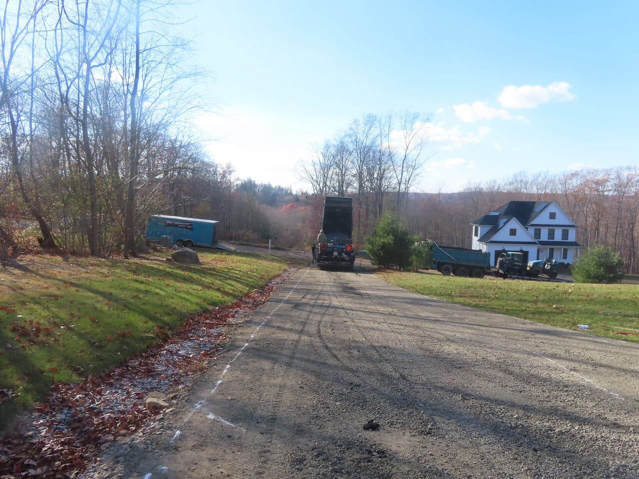 Residential Driveway Paving project in Middletown, CT — fresh paver laydown on long driveway
