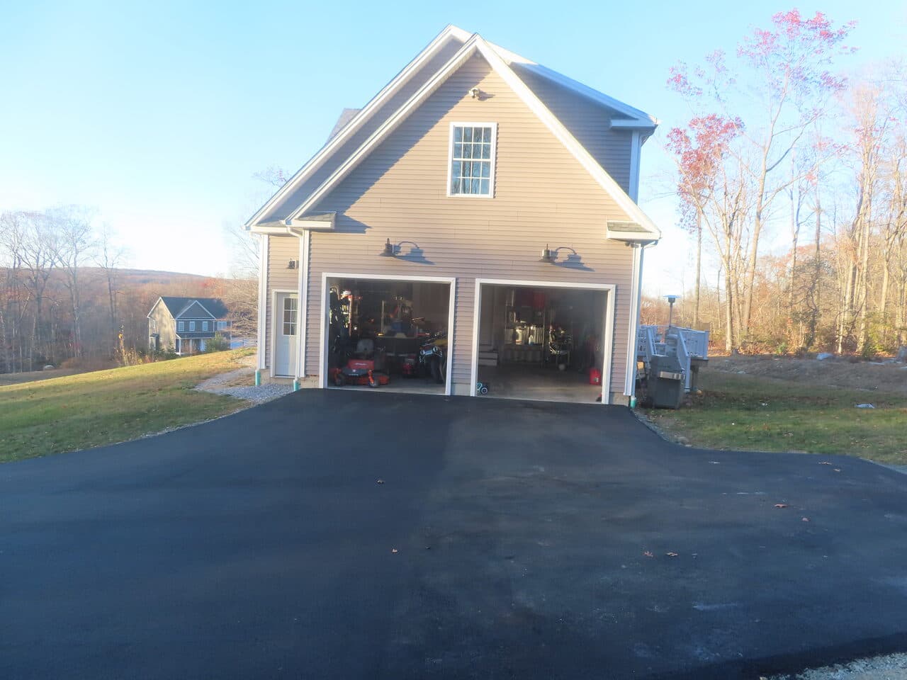 Residential Driveway Paving project in Middletown, CT — finished driveway at two-car garage