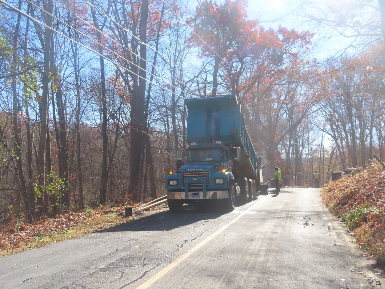 Roadway Paving project in Northford, CT — dump truck on rural road paving