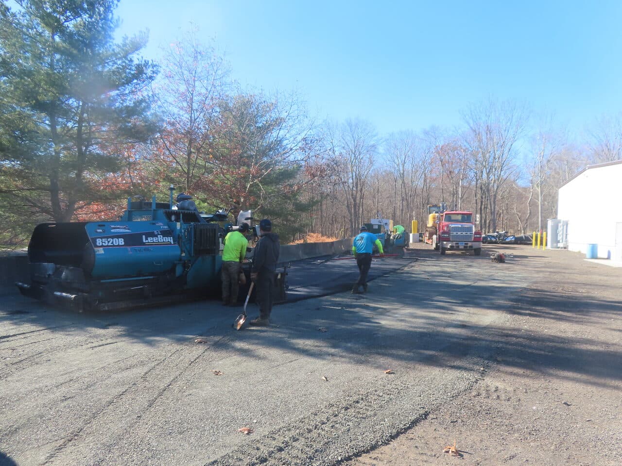 Roadway Paving project in Northford, CT — crew paving lot with LeeBoy paver