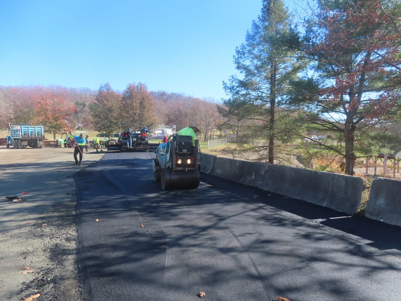 Roadway Paving project in Northford, CT — roller compacting fresh asphalt lot