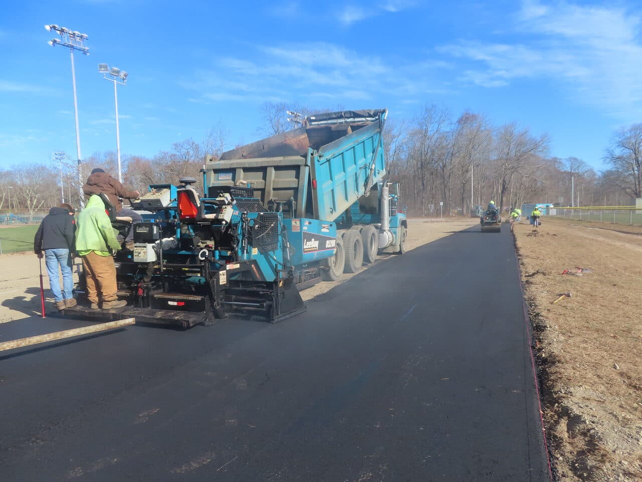 Commercial Parking Lot Paving project in Montville, CT — paving new asphalt at ballfield lot
