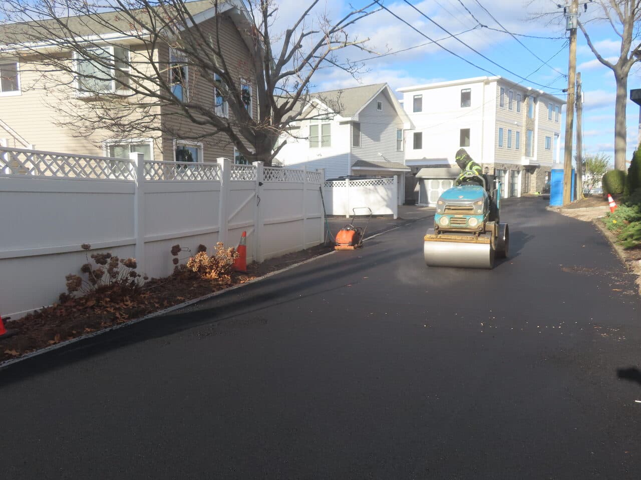Roadway Paving project in Branford, CT — roller compacting fresh asphalt