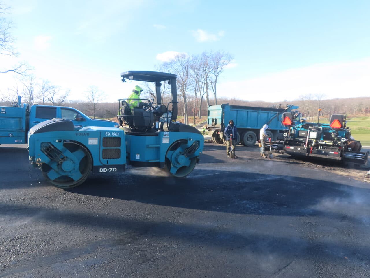 Golf Course Paving project in New Haven, CT — Volvo DD-70 roller compacting asphalt
