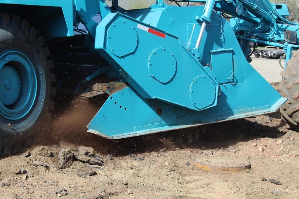 Maisano Bros. Inc. close-up machinery digging dirt