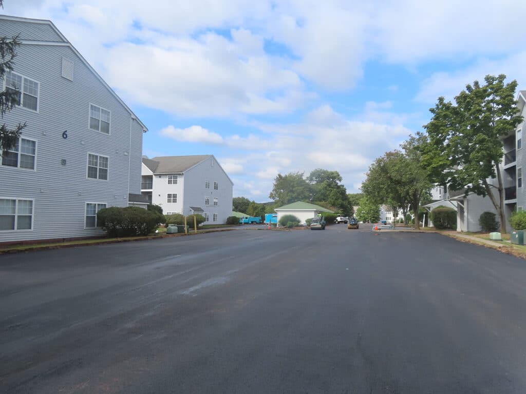 Newly paved asphalt parking area at a residential apartment complex in Hamden, Connecticut